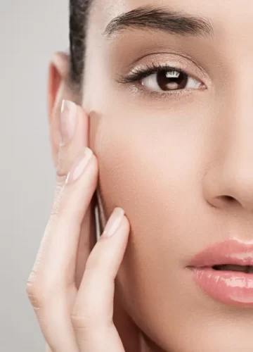 woman-with-hand-on-face-after-using-products.jpg
